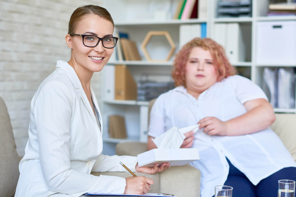 beautiful-psychiatrist-posing-during-therapy-sessi-HX3FLGP(1)-1