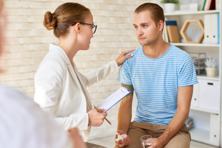 young-man-crying-in-support-group-BWMTJP3 (1)